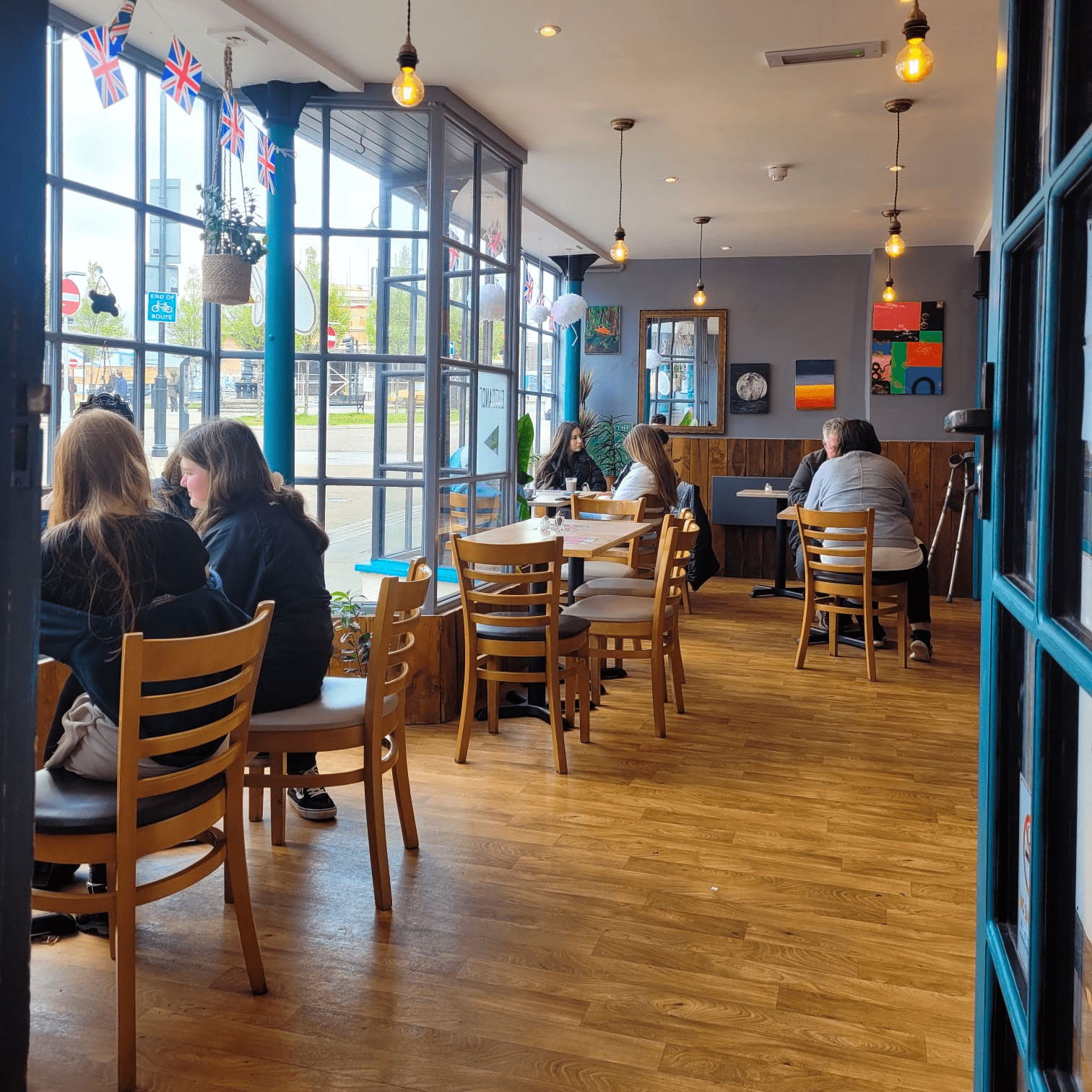 Cafeness customers enjoying coffees..